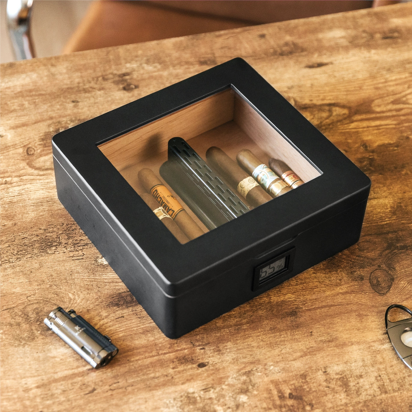 Matte black MAG Desktop Humidor with Spanish cedar inlay, digital hygrometer, and innovative Hydro Channel system