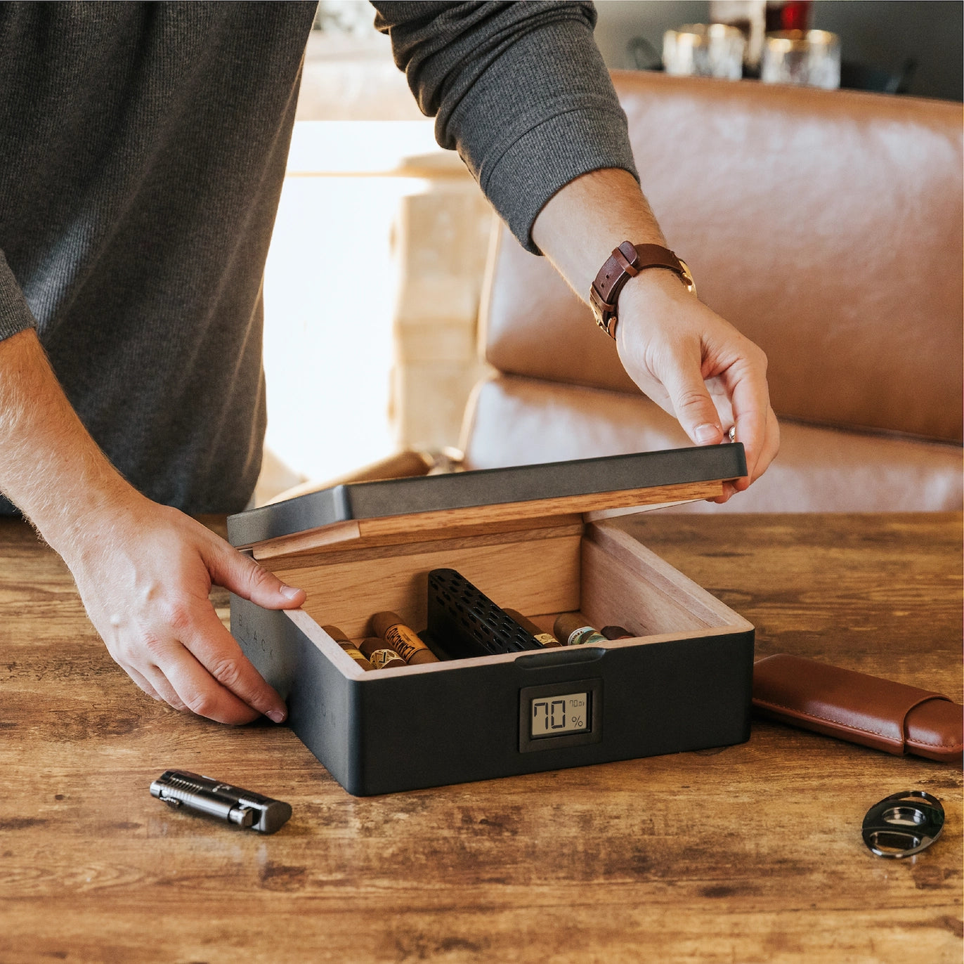 Matte black MAG Desktop Humidor with Spanish cedar inlay, digital hygrometer, and innovative Hydro Channel system