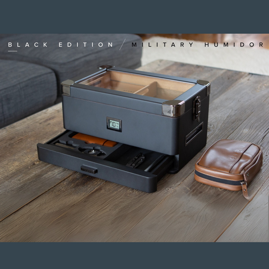 Luxury Military Humidor Cabinet featuring black ash, gold accents, PEG-organized drawers, and Hydro Tray humidity control.