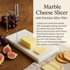 Luxury marble cheese board with stainless steel cutter, perfect for charcuterie and elegant kitchenware gifts