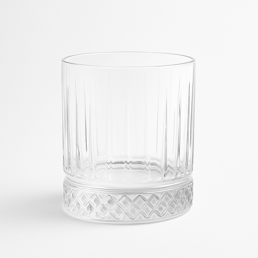Diamond base whiskey glass with vertical cuts and heavy crystal design