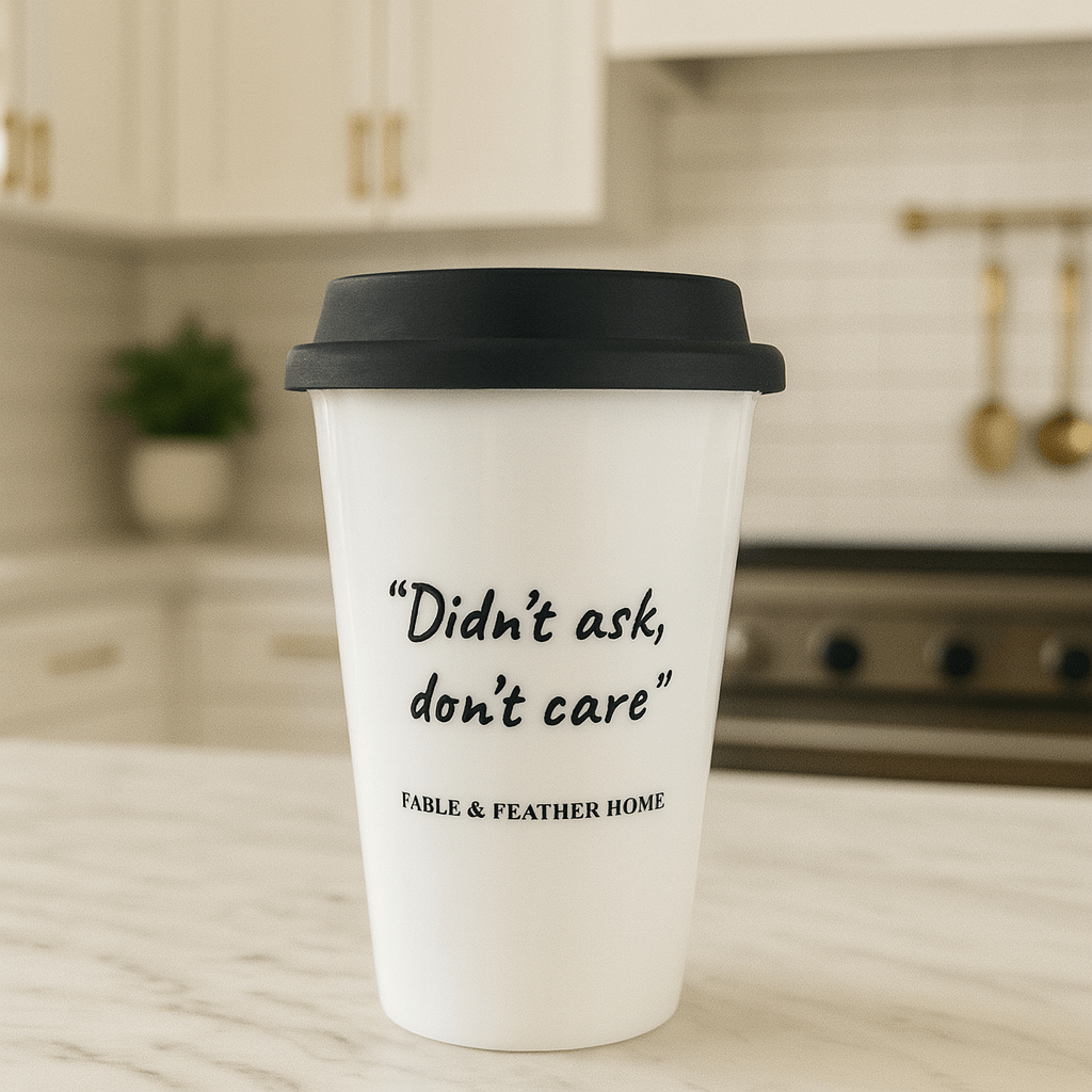Didn’t Ask, Don’t Care ceramic mug placed on a marble kitchen countertop with a bright, clean background.
