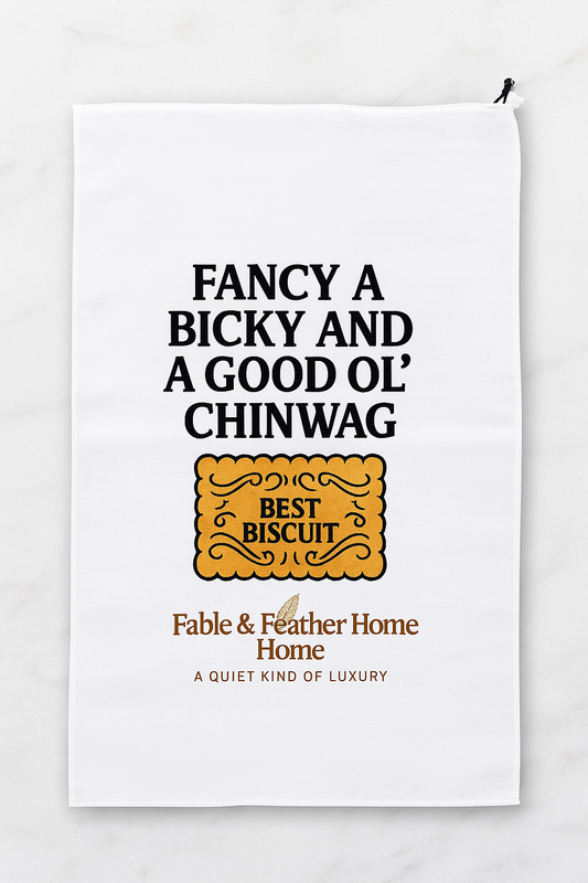 Funny Tea Towel Fancy A Bicky And A Good O'l Chinwag Laying On a Marble Counter