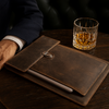 Luxury handcrafted leather laptop sleeve with vintage cowhide and Featherstone finish, perfect for elegant protection.