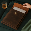 Luxury handcrafted leather laptop sleeve with vintage cowhide and Featherstone finish, perfect for elegant protection.