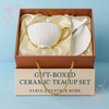 Elegant gold rimmed ceramic teacup with saucer and spoon, luxury tea set gift box perfect for teacup lovers in Canada