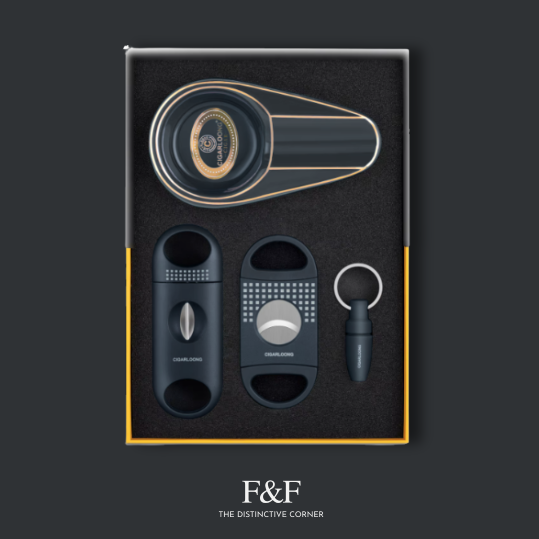 Luxury cigar accessory set presented in black velvet-lined gift box