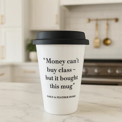 Money Can’t Buy Class But It Bought This Mug – ceramic mug from the Cheeky Mug Collection displayed on a marble kitchen countertop with a bright, clean background.