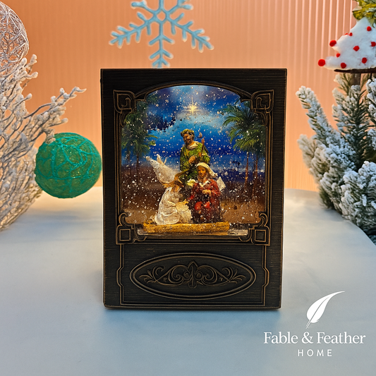Nativity snow globe book with Holy Family scene – Fable & Feather Home