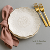 Round 6-inch white ceramic dessert plate with gold edge