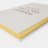 Guided mindfulness reflection notebook with gold-edged pages