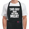 Funny BBQ apron with white text saying ‘This Guy Rubs His Own Meat’ on black cotton.