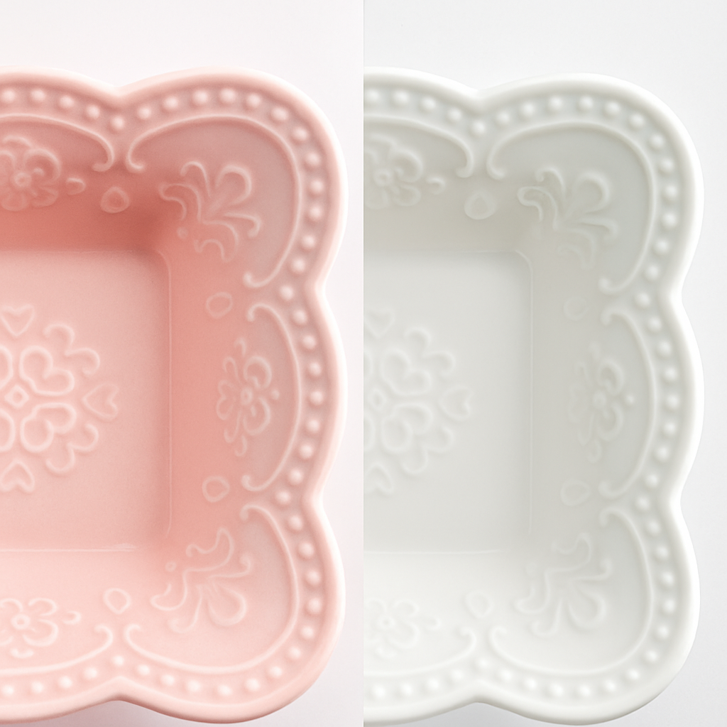 White and pink vintage-style ceramic bowls with scalloped edges