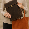 Luxury handcrafted leather laptop sleeve with vintage cowhide and Featherstone finish, perfect for elegant protection.