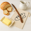 Reusable cotton bread bag with round loaf and butter dish on wooden counter – Fable & Feather Home Canada