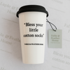 Funny British ceramic travel mug with “Bless Your Little Cotton Socks” quote — Fable & Feather Home.